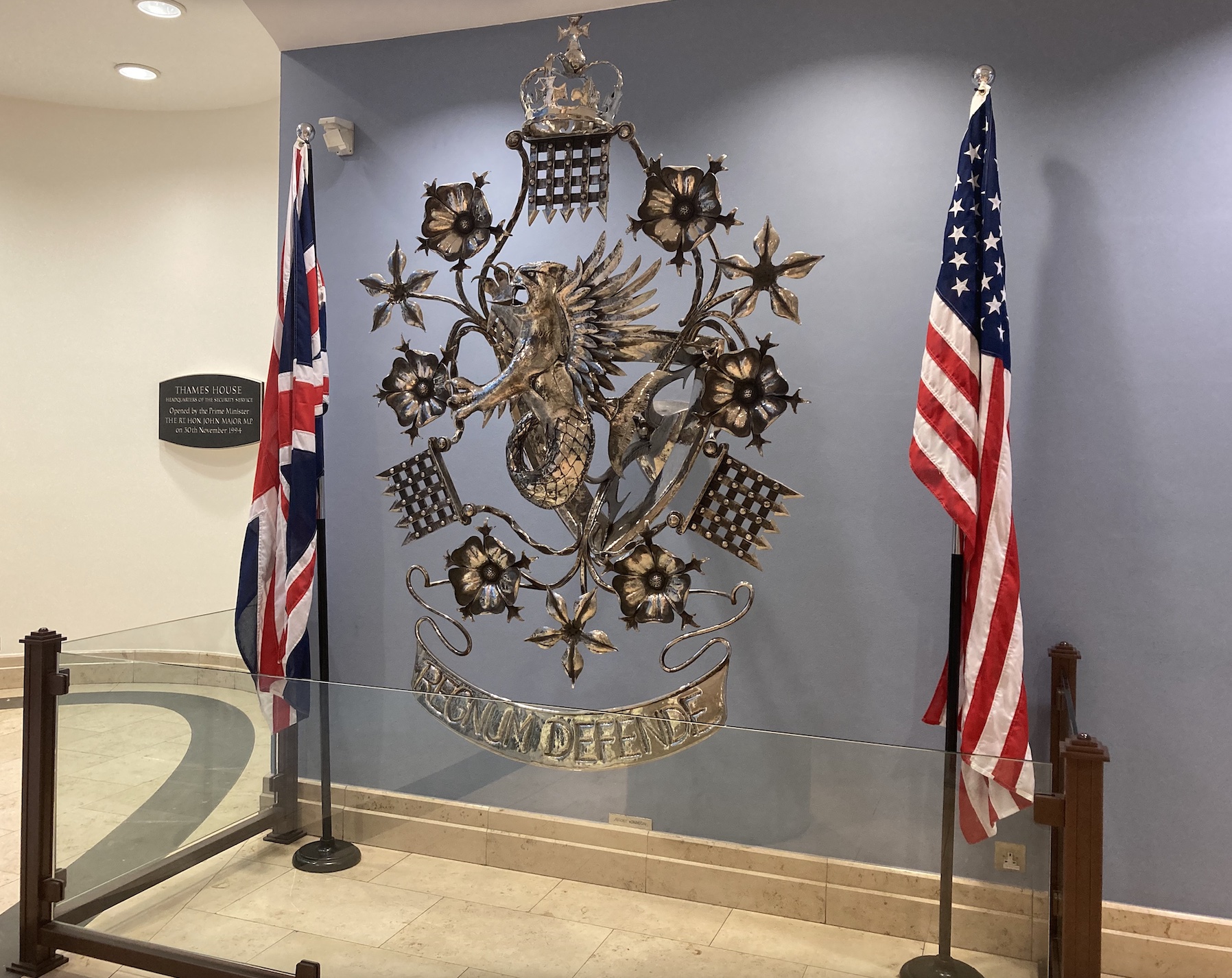 The UK and US flags alongside each other in the entrance of Thames House
